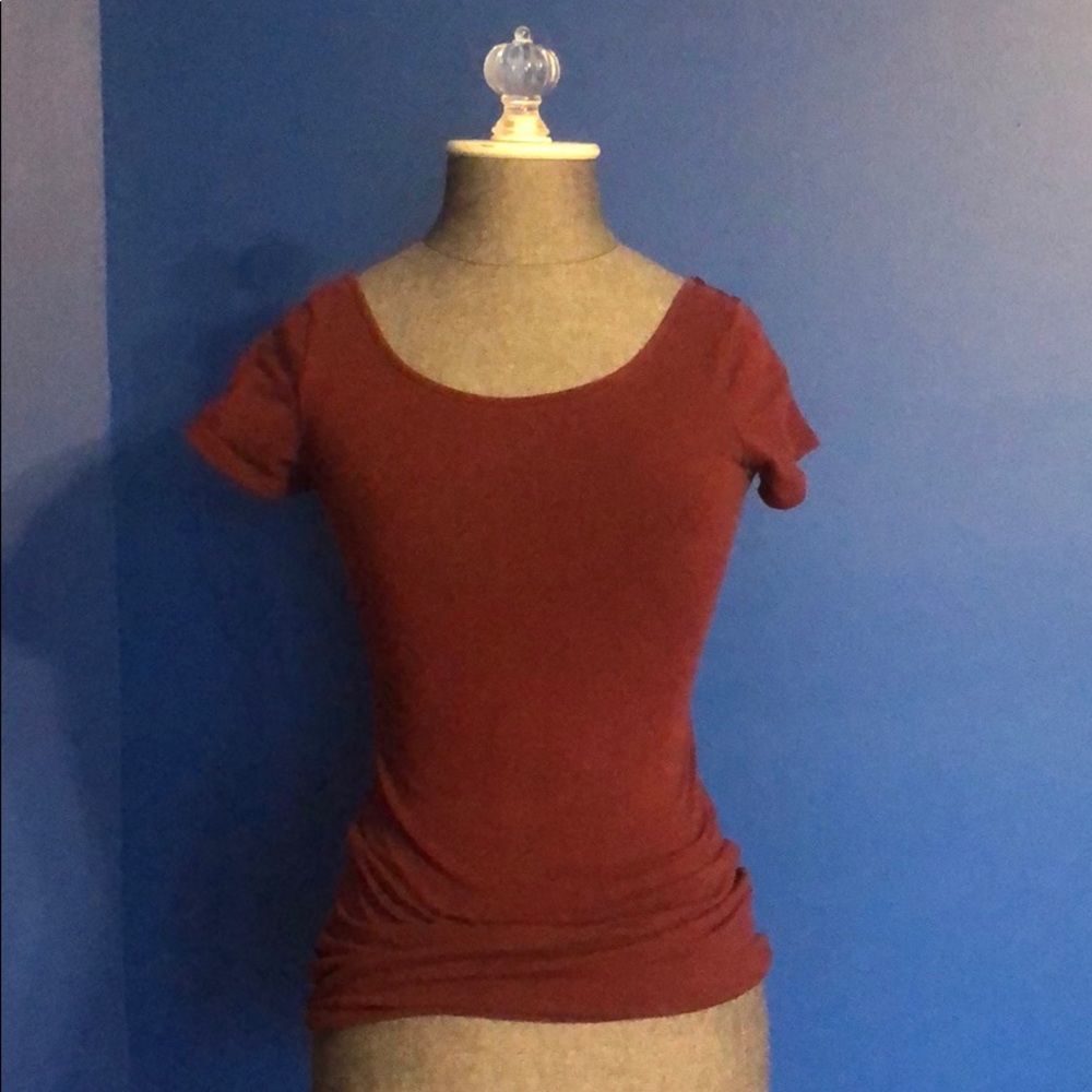 Tight maroon colored top